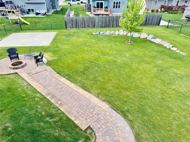 1008 Pine Brooke Ct, Clear Lake, IA 50428 - view of yard with an outdoor fire pit