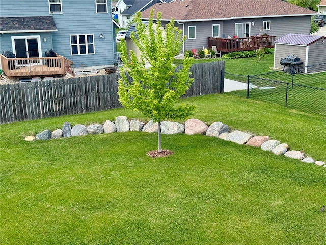 1008 Pine Brooke Ct, Clear Lake, IA 50428 - view of yard with a wooden deck