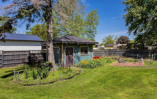 201 Jet St SW, Mitchellville, IA 50169 - view of outdoor structure featuring a garden