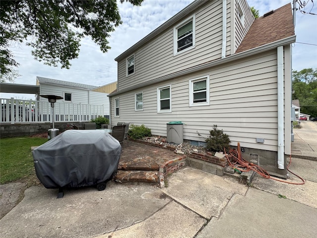 1300 Shawnee Ave, Des Moines, IA 50313 - back of property featuring a patio area and crawl space
