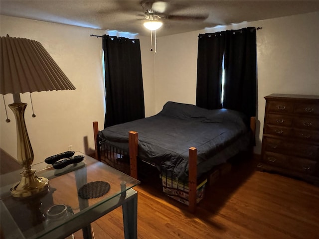 1300 Shawnee Ave, Des Moines, IA 50313 - bedroom with wood finished floors and ceiling fan