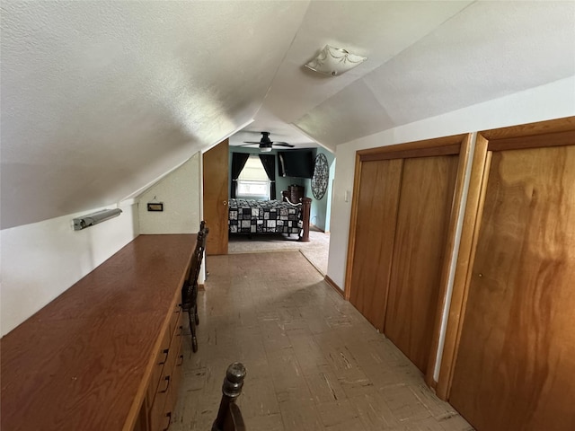 1300 Shawnee Ave, Des Moines, IA 50313 - bonus room featuring vaulted ceiling and a ceiling fan