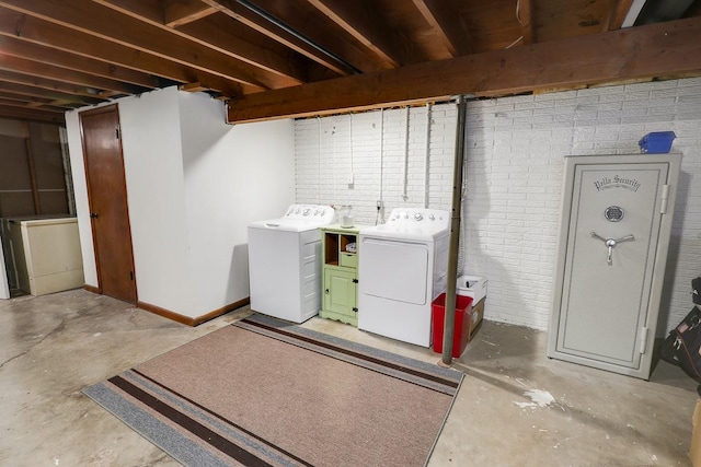216 E 9th St, Pella, IA 50219 - unfinished below grade area with separate washer and dryer and baseboards