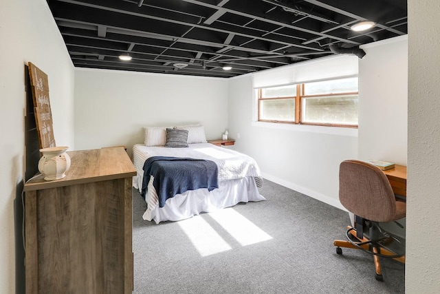 216 E 9th St, Pella, IA 50219 - bedroom featuring carpet flooring and baseboards