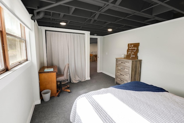 216 E 9th St, Pella, IA 50219 - carpeted bedroom with baseboards