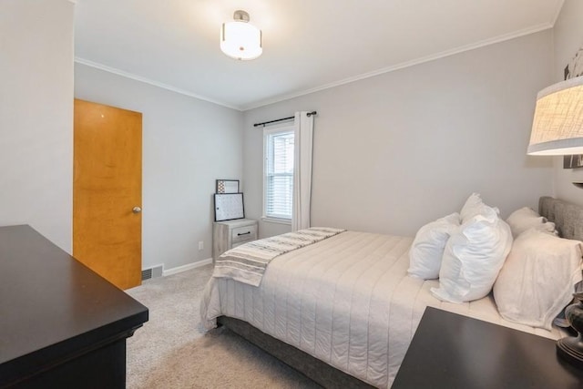 6100 College Ave, Des Moines, IA 50322 - carpeted bedroom with ornamental molding and baseboards