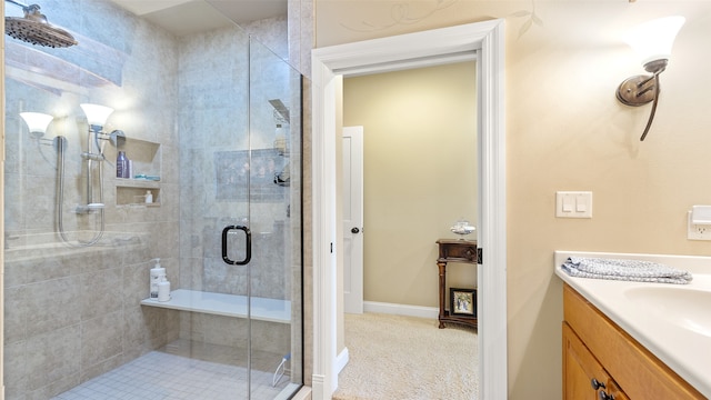 510 Lexington Dr, Clear Lake, IA 50428 - full bath with a shower stall, vanity, and baseboards