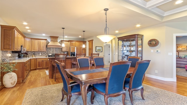 510 Lexington Dr, Clear Lake, IA 50428 - dining space with light wood finished floors, recessed lighting, ornamental molding, baseboards, and beamed ceiling