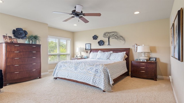510 Lexington Dr, Clear Lake, IA 50428 - bedroom featuring light colored carpet, recessed lighting, baseboards, and a ceiling fan
