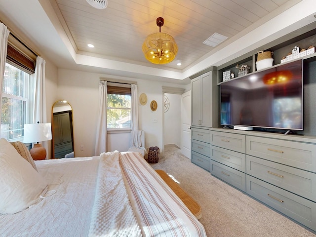 1314 Glenway Dr, Newton, IA 50208 - bedroom featuring carpet flooring, a chandelier, a tray ceiling, and recessed lighting