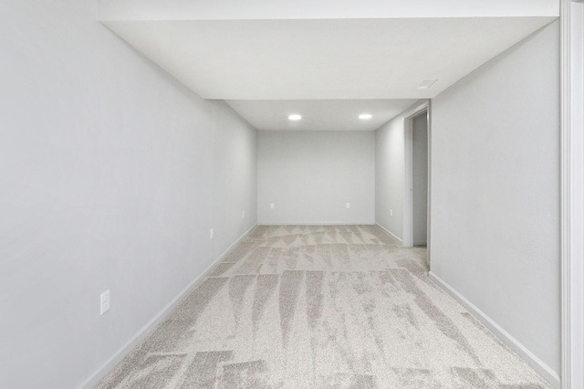 314 E Front St, Colfax, IA 50054 - finished basement with light carpet, recessed lighting, and baseboards