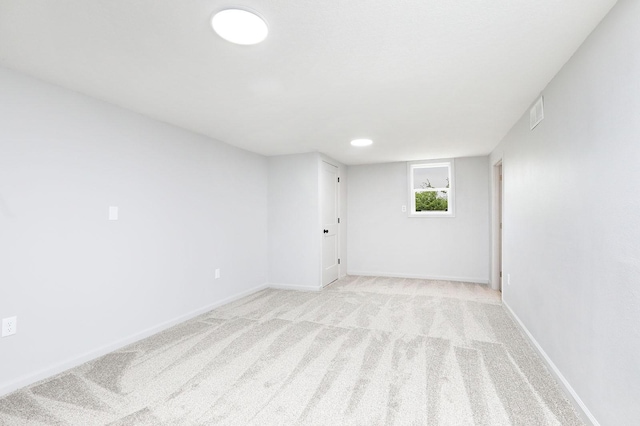 314 E Front St, Colfax, IA 50054 - empty room with light colored carpet and baseboards