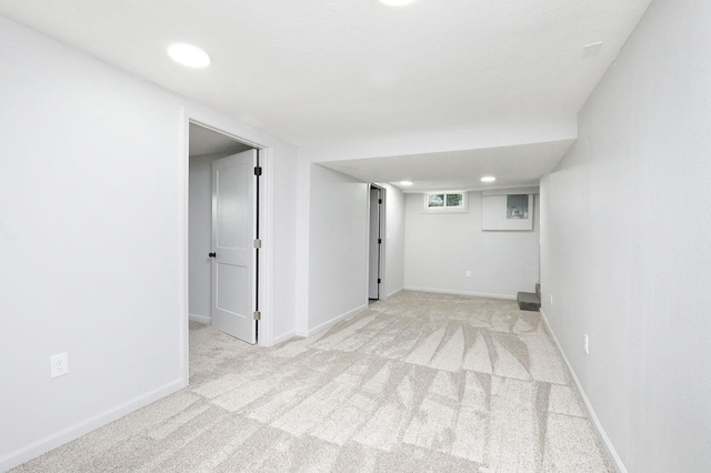 314 E Front St, Colfax, IA 50054 - below grade area featuring carpet, recessed lighting, and baseboards