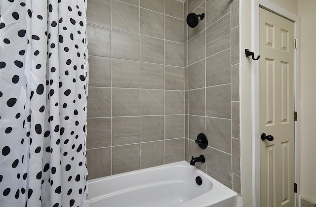 2112 E 23rd St, Des Moines, IA 50317 - bathroom featuring shower / bath combination with curtain