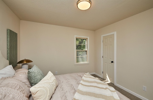 2112 E 23rd St, Des Moines, IA 50317 - carpeted bedroom featuring baseboards