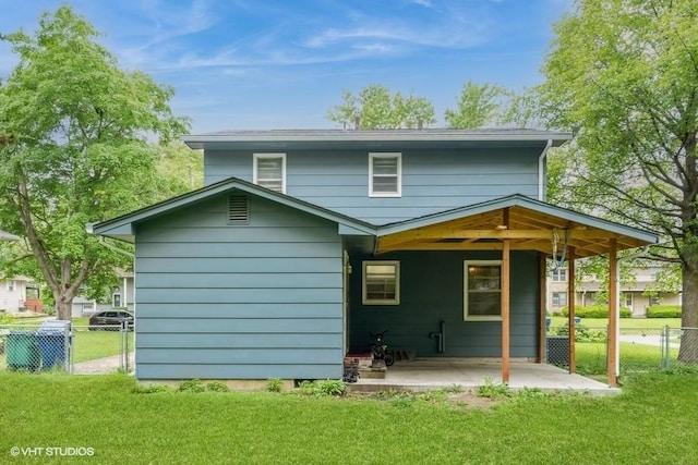 4305 65th St, Urbandale, IA 50322 - rear view of house with a patio