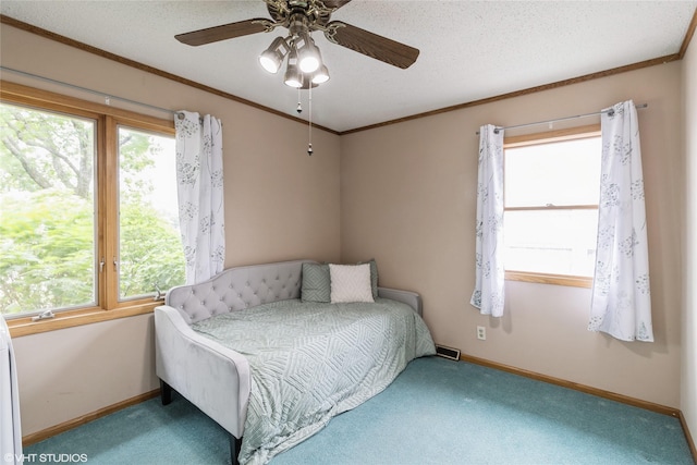 529 NW State St, Ankeny, IA 50023 - bedroom featuring carpet floors, baseboards, a ceiling fan, and crown molding