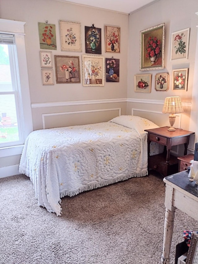 318 W Green St, Winterset, IA 50273 - carpeted bedroom with multiple windows