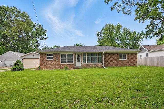 2620 Arnold Rd, Des Moines, IA 50310 - rear view of house featuring a garage and brick siding