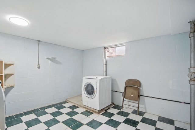 2620 Arnold Rd, Des Moines, IA 50310 - laundry area featuring washer / clothes dryer, tile patterned floors, and concrete block wall