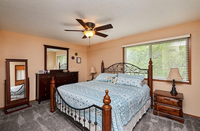 4230 SE 23rd St, Des Moines, IA 50320 - bedroom featuring carpet, baseboards, and ceiling fan