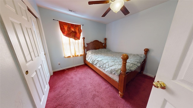 1534 18th St, Des Moines, IA 50314 - carpeted bedroom with baseboards and a ceiling fan