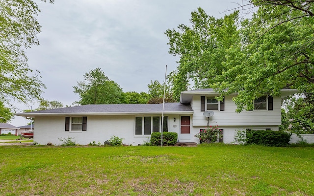 7405 Aurora Ave, Urbandale, IA 50322 - tri-level home with a front yard