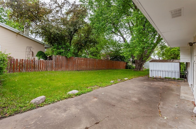 7405 Aurora Ave, Urbandale, IA 50322 - view of yard with a patio area