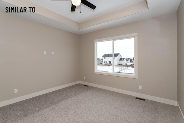 532 Wicker Dr, Huxley, IA 50124 - empty room featuring carpet, baseboards, and ceiling fan