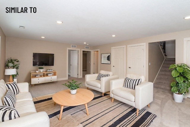 532 Wicker Dr, Huxley, IA 50124 - living room featuring stairway, recessed lighting, baseboards, and light carpet