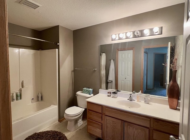 3799 Village Run Dr Unit 512, Des Moines, IA 50317 - full bath featuring vanity, toilet, shower / tub combination, a textured ceiling, and tile patterned floors