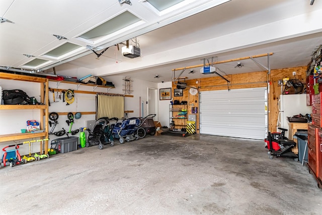 405 Joy Cir, Gilbert, IA 50105 - garage featuring a garage door opener