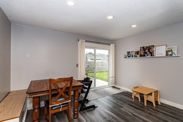 405 Joy Cir, Gilbert, IA 50105 - dining room featuring dark wood-type flooring, baseboards, a textured ceiling, recessed lighting, and a desk
