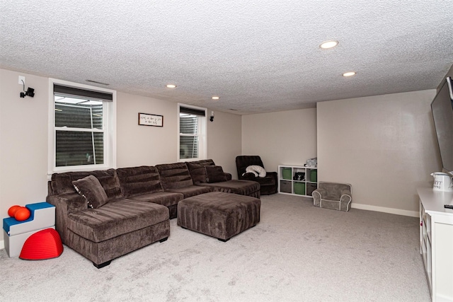 405 Joy Cir, Gilbert, IA 50105 - carpeted living room with a textured ceiling, recessed lighting, and baseboards
