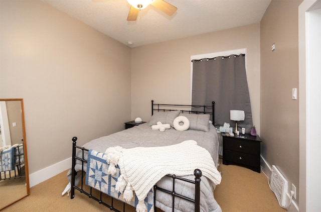 1058 40th St, Des Moines, IA 50311 - bedroom featuring carpet flooring, ceiling fan, and baseboards