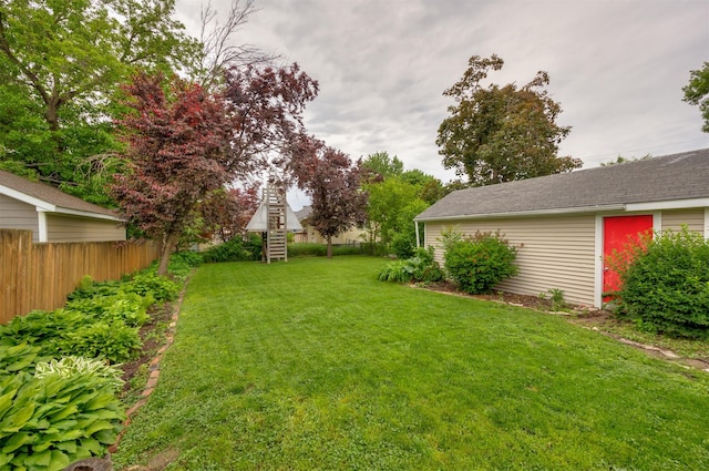 1058 40th St, Des Moines, IA 50311 - view of yard featuring stairs