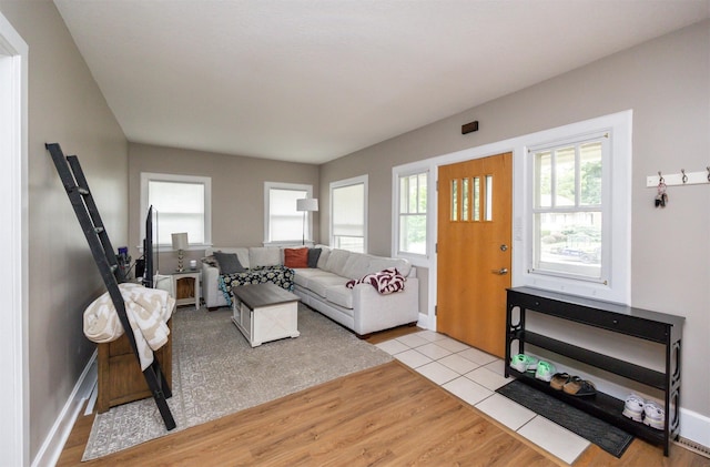 1058 40th St, Des Moines, IA 50311 - living area with wood finished floors and baseboards