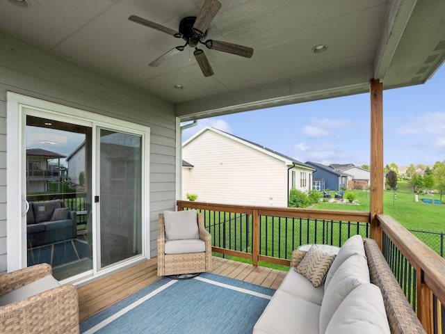 8876 Scarlet Dr, West Des Moines, IA 50266 - wooden terrace with ceiling fan, a yard, a residential view, and an outdoor hangout area