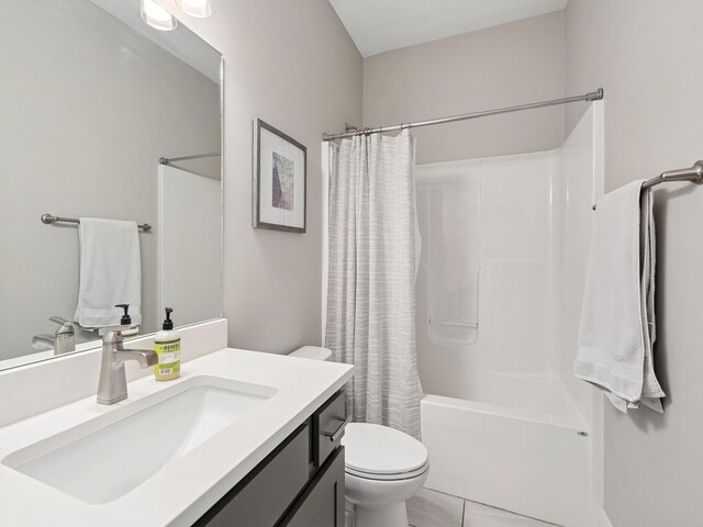 8876 Scarlet Dr, West Des Moines, IA 50266 - full bath with toilet, vanity, shower / bath combo with shower curtain, and tile patterned floors