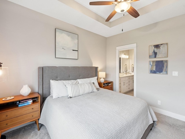 8876 Scarlet Dr, West Des Moines, IA 50266 - bedroom with light colored carpet, connected bathroom, baseboards, and ceiling fan