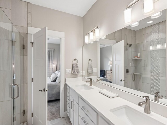 8876 Scarlet Dr, West Des Moines, IA 50266 - ensuite bathroom featuring double vanity and a stall shower