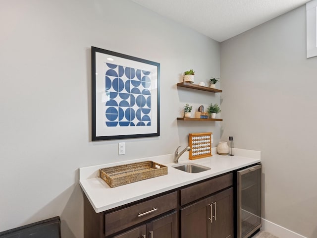 8876 Scarlet Dr, West Des Moines, IA 50266 - bar area with a sink and wine cooler
