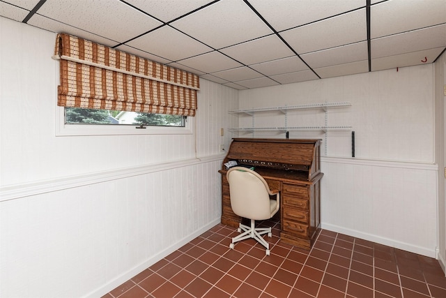 203 11th St, Dallas Center, IA 50063 - office area with baseboards, dark tile patterned floors, and a drop ceiling