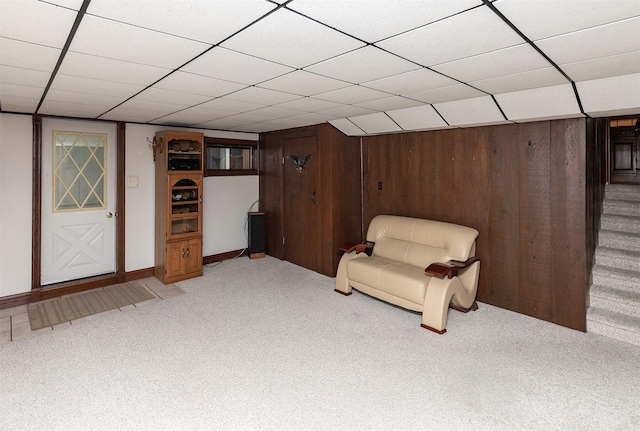 203 11th St, Dallas Center, IA 50063 - living area featuring light carpet, a paneled ceiling, and baseboards