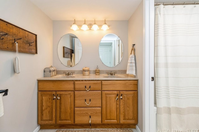 105 S Shore Dr, Montezuma, IA 50171 - full bath with double vanity, baseboards, and curtained shower