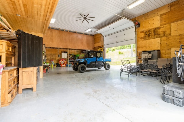 105 S Shore Dr, Montezuma, IA 50171 - garage with wood walls