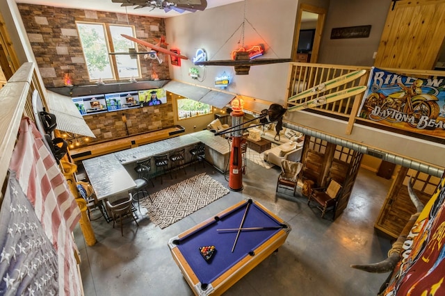 105 S Shore Dr, Montezuma, IA 50171 - rec room with finished concrete floors, a ceiling fan, and billiards table