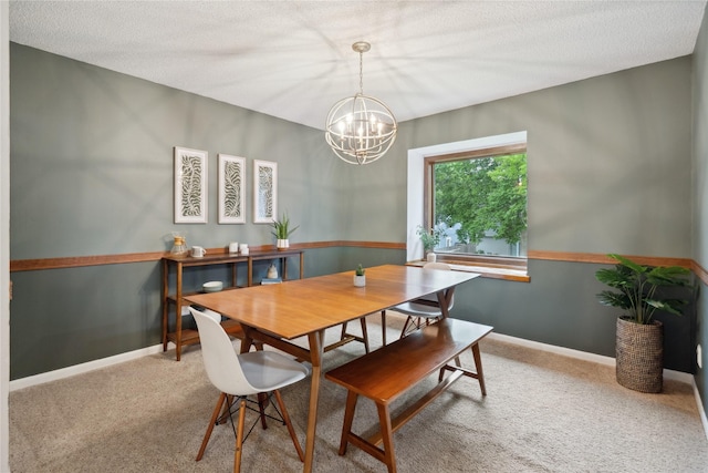 1645 NW 101st St, Clive, IA 50325 - dining space featuring a chandelier, carpet floors, a textured ceiling, and baseboards