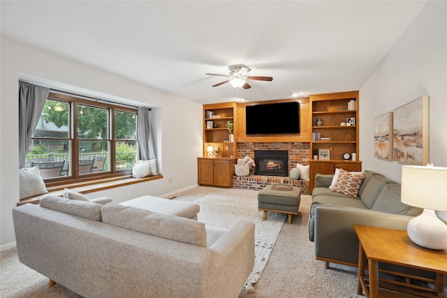 1645 NW 101st St, Clive, IA 50325 - living area featuring ceiling fan, light colored carpet, and baseboards