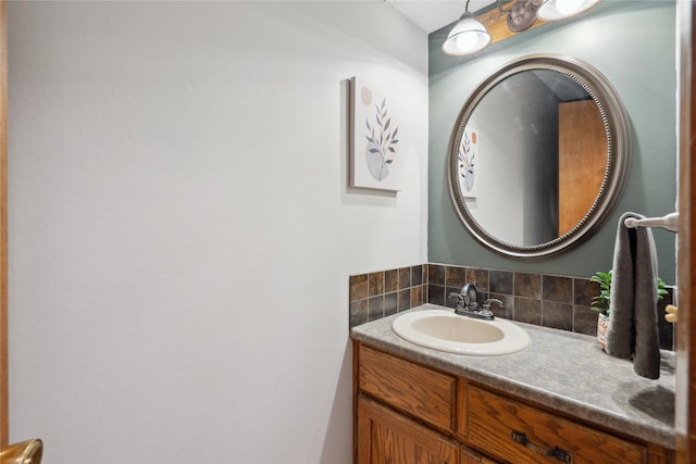 1645 NW 101st St, Clive, IA 50325 - bathroom featuring tasteful backsplash and vanity
